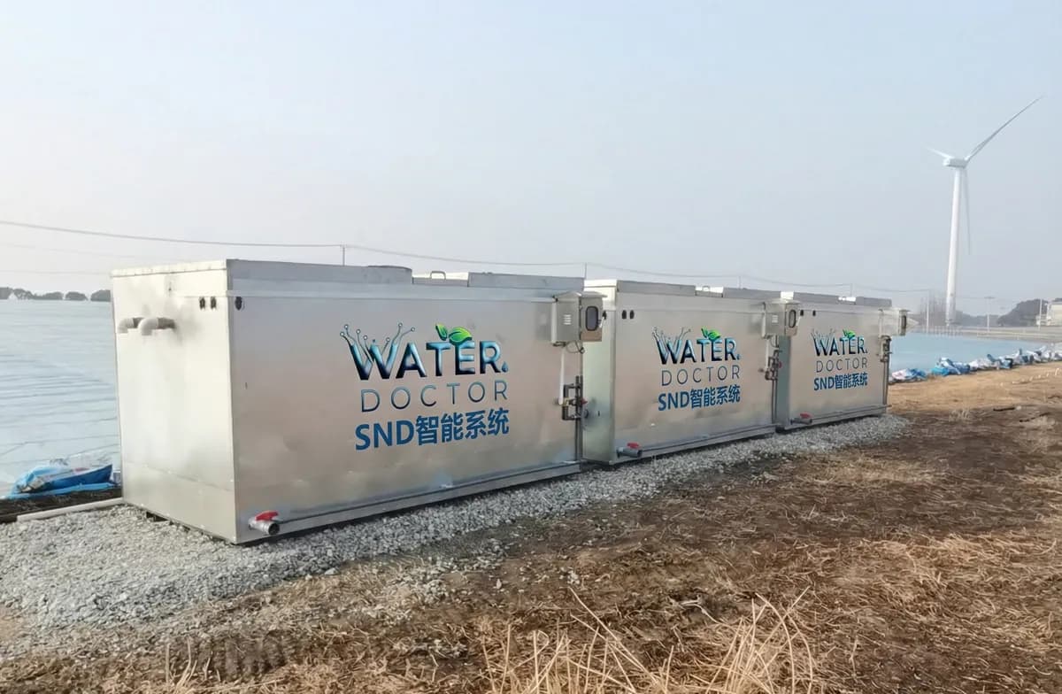 Water Doctor biological water treatment system operating beside aquaculture ponds